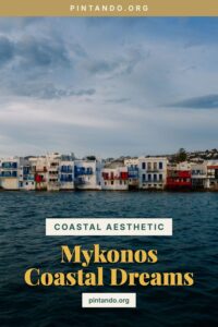 The iconic Mykonos windmills above the Aegean sea at sunset, the classic Greek island coastal aesthetic.