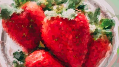 A watercolor bowl of strawberries shown mid-process — the berries underpainted in muted green before the true red is glazed on top, with a floating color palette beside them.