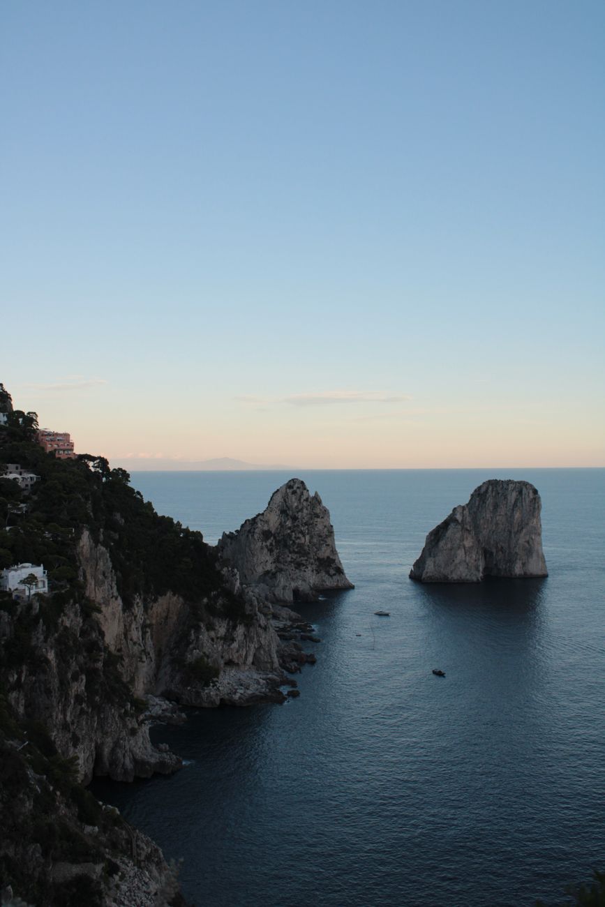 The Faraglioni sea stacks of Capri rising from the deep blue Mediterranean