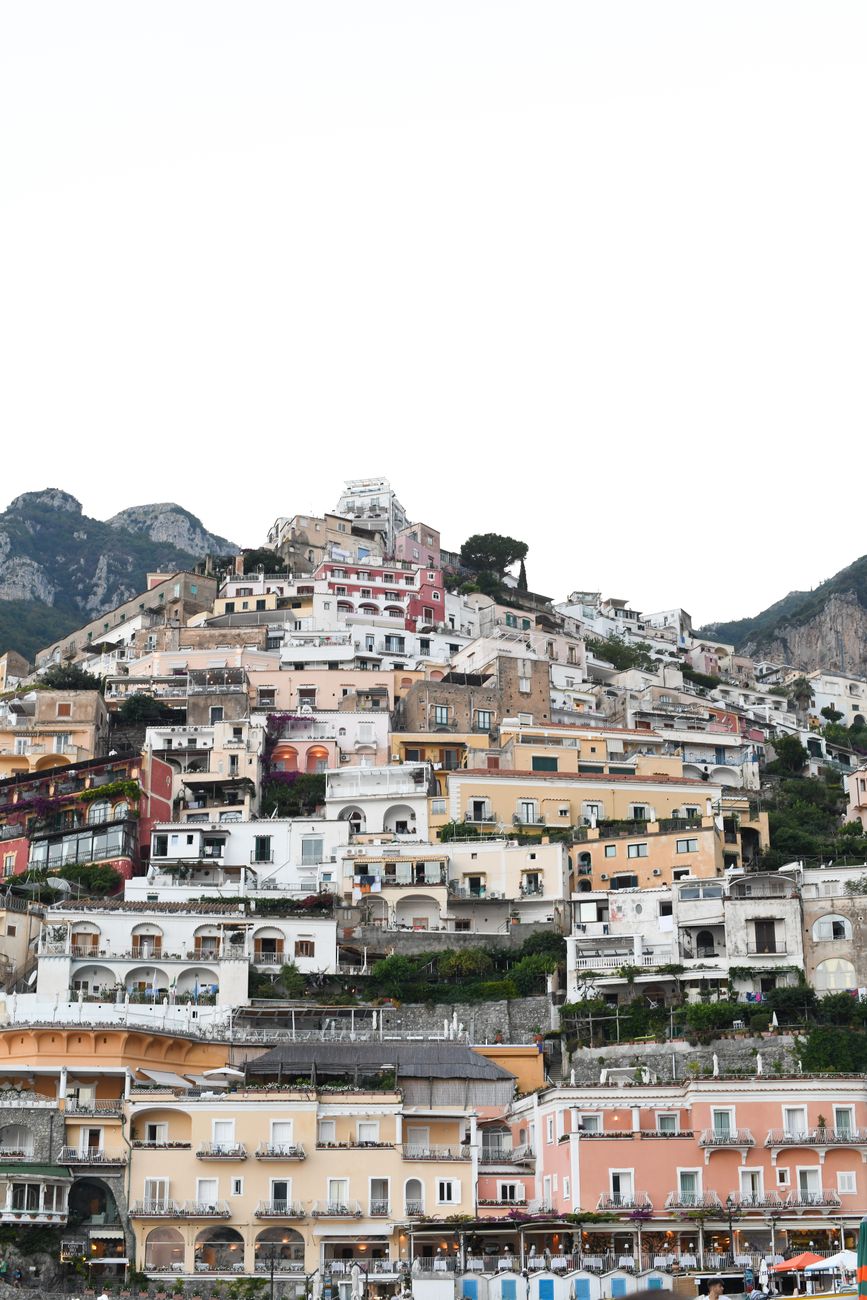 Positano on the Amalfi Coast — pastel houses cascading down the cliff to the turquoise sea